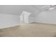 Bright bonus room featuring neutral carpeting, white walls, and a window seat and dormer window at 142 Maxwell Rd, Summerville, SC 29483
