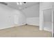 Spacious bonus room with neutral carpeting, white walls, and two doorways leading to other rooms at 142 Maxwell Rd, Summerville, SC 29483