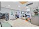 A large bonus room offers flexible space, tiled flooring, and easy access to the outside at 142 Maxwell Rd, Summerville, SC 29483