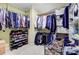 Walk-in closet with hanging clothes and shelving at 142 Maxwell Rd, Summerville, SC 29483