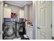 Practical laundry room equipped with modern washer and dryer units at 142 Maxwell Rd, Summerville, SC 29483