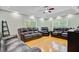 Spacious living room featuring hardwood floors, neutral paint, ceiling fan, and recessed lighting at 142 Maxwell Rd, Summerville, SC 29483