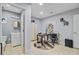 Well-lit office provides seating and storage solutions, located conveniently near a restroom for practical use at 142 Maxwell Rd, Summerville, SC 29483