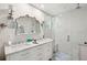 Modern bathroom features double sinks, vanity, glass shower, and stylish lighting at 1446 Burningtree Rd, Charleston, SC 29412