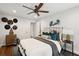 Comfortable bedroom features a ceiling fan, modern decor, and hardwood floors at 1446 Burningtree Rd, Charleston, SC 29412