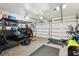 Spacious garage featuring epoxy flooring, overhead storage, and room for multiple vehicles at 1446 Burningtree Rd, Charleston, SC 29412