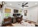Bright office space with hardwood floors, dual monitors, and a comfortable chair at 1446 Burningtree Rd, Charleston, SC 29412