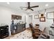 Well-appointed home office features hardwood floors, mounted monitors, and stylish decor at 1446 Burningtree Rd, Charleston, SC 29412