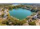 A beautiful aerial view of the lake community, showcasing lush trees at 1552 Harborsun Dr, Charleston, SC 29412