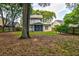 Great home featuring a screened in porch in a large fenced in backyard and mature landscaping at 1552 Harborsun Dr, Charleston, SC 29412
