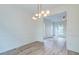 Bright dining area featuring modern floors and stylish lighting fixtures at 1552 Harborsun Dr, Charleston, SC 29412