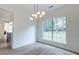 Bright dining area featuring modern floors, stylish lighting, and large window at 1552 Harborsun Dr, Charleston, SC 29412