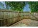 Enclosed backyard area with a wooden fence, providing privacy and security at 1686 Hunters Run Dr, Mount Pleasant, SC 29464