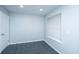 Bedroom is bright and airy with a window and tile floors at 1686 Hunters Run Dr, Mount Pleasant, SC 29464