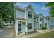 Charming townhouse with light blue siding and well-maintained landscaping at 1686 Hunters Run Dr, Mount Pleasant, SC 29464