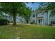 Charming townhomes featuring light blue siding, and grassy lawns at 1686 Hunters Run Dr, Mount Pleasant, SC 29464