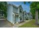 Attractive townhomes with light blue siding and well-kept lawns at 1686 Hunters Run Dr, Mount Pleasant, SC 29464