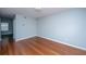 Spacious room with hardwood floors, neutral paint, and ample natural light at 1686 Hunters Run Dr, Mount Pleasant, SC 29464