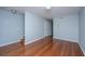 Living room with hardwood floors and neutral colored walls, ready for your personal touch at 1686 Hunters Run Dr, Mount Pleasant, SC 29464