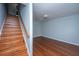 Staircase with wood steps and handrail leading to additional living spaces at 1686 Hunters Run Dr, Mount Pleasant, SC 29464