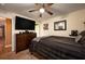 Large bedroom with a TV, wood floors and an en-suite at 1705 Bella Terra Ln, Charleston, SC 29412