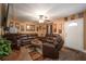Inviting living room featuring wood floors, ceiling fan and ample seating at 1705 Bella Terra Ln, Charleston, SC 29412
