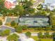 Aerial view of outdoor facilities, including tennis and basketball courts, nestled in a residential neighborhood at 1800 Palmetto Isle Dr, Mount Pleasant, SC 29466