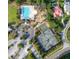 Aerial view showcasing the community pool, playground, and tennis and basketball courts at 1800 Palmetto Isle Dr, Mount Pleasant, SC 29466