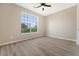 Bedroom with light wood floors and a large window to let in natural light at 1800 Palmetto Isle Dr, Mount Pleasant, SC 29466