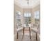 Charming breakfast nook bathed in natural light, with a cozy table and seating to enjoy the morning sun at 1800 Palmetto Isle Dr, Mount Pleasant, SC 29466