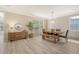 Well-lit dining room with modern furniture, stylish sideboard, and elegant decor at 1800 Palmetto Isle Dr, Mount Pleasant, SC 29466