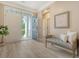 Welcoming foyer with elegant flooring, a comfortable bench, and bright natural light at 1800 Palmetto Isle Dr, Mount Pleasant, SC 29466
