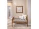 Comfortable foyer bench with stylish throw pillows, perfect for welcoming guests at 1800 Palmetto Isle Dr, Mount Pleasant, SC 29466