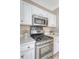 Well-equipped kitchen with stainless steel appliances and plenty of counter space for preparing gourmet meals at 1800 Palmetto Isle Dr, Mount Pleasant, SC 29466