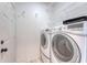 Laundry room with white washer and dryer set at 1800 Palmetto Isle Dr, Mount Pleasant, SC 29466