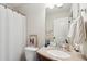 Bathroom featuring a vanity with granite countertops and a framed mirror at 1928 Gasque St, Johns Island, SC 29455