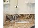 Close up of the vanity sink showing granite countertops and chrome faucet at 1928 Gasque St, Johns Island, SC 29455