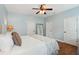 Light and airy bedroom with hardwood floors, ceiling fan and a mirror at 1928 Gasque St, Johns Island, SC 29455