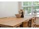 Dining area showcases natural light, modern accents, and a rustic wooden table at 1928 Gasque St, Johns Island, SC 29455