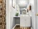 Bathroom with white vanity, brown floor mat, artwork, and shower with curtain at 201 Pine Shadow Dr, Goose Creek, SC 29445