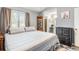 Bedroom featuring bed, window, art, and entry to ensuite bath at 201 Pine Shadow Dr, Goose Creek, SC 29445