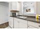 Efficient kitchen featuring sleek countertops, white cabinetry, and modern appliances at 201 Pine Shadow Dr, Goose Creek, SC 29445