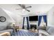 Comfortable living room boasts a fireplace, bright windows with curtains, and a ceiling fan at 201 Pine Shadow Dr, Goose Creek, SC 29445