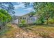 Expansive deck overlooks the lush backyard, perfect for relaxing and entertaining at 208 State St, Walterboro, SC 29488