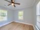 Bedroom with multiple windows and light-blue walls at 208 State St, Walterboro, SC 29488