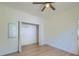 Bright bedroom with light wood floors and closet at 208 State St, Walterboro, SC 29488