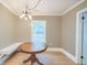 Light-filled breakfast nook with built-in seating and a view of the outdoors at 208 State St, Walterboro, SC 29488
