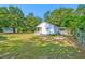 Home with white siding, covered porch, and a well-maintained yard at 208 State St, Walterboro, SC 29488