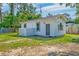 Exterior shot of the house and yard at 208 State St, Walterboro, SC 29488