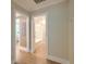 Hallway leading to a bathroom and laundry room at 208 State St, Walterboro, SC 29488